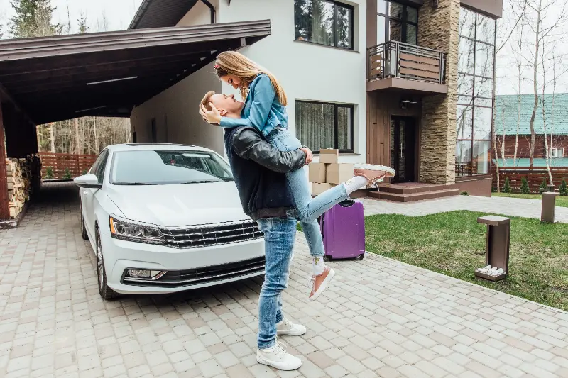 happy-family-standing-courtyard-looking-each-other-near-their-house